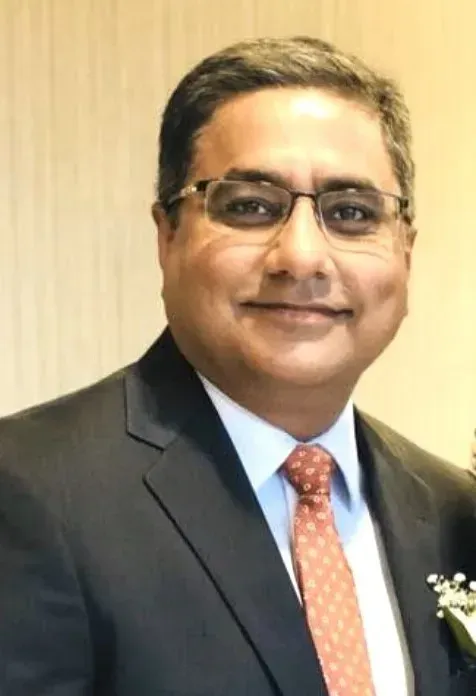 Dr. Waseem Mughal, BDS, DMD, FICOI